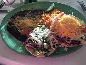 Picture of taco plate with beans and rice
